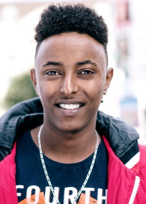 "I am from Eritrea. I came here to experience peace and live in freedom. Most people here are good to us, but some people are crazy, they hate us. […] Some people also attack refugees. Last year someone threw a bottle at us. But not everyone is like that."